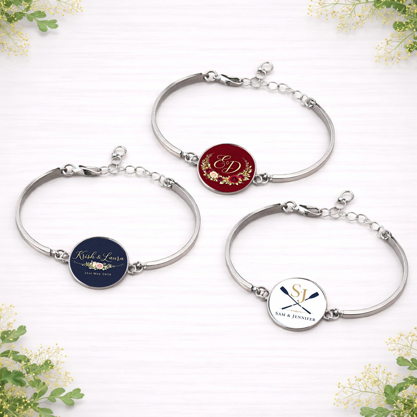 Personalised wedding logo bracelets in silver with custom monogram and floral crest designs on red, navy and white backgrounds.
