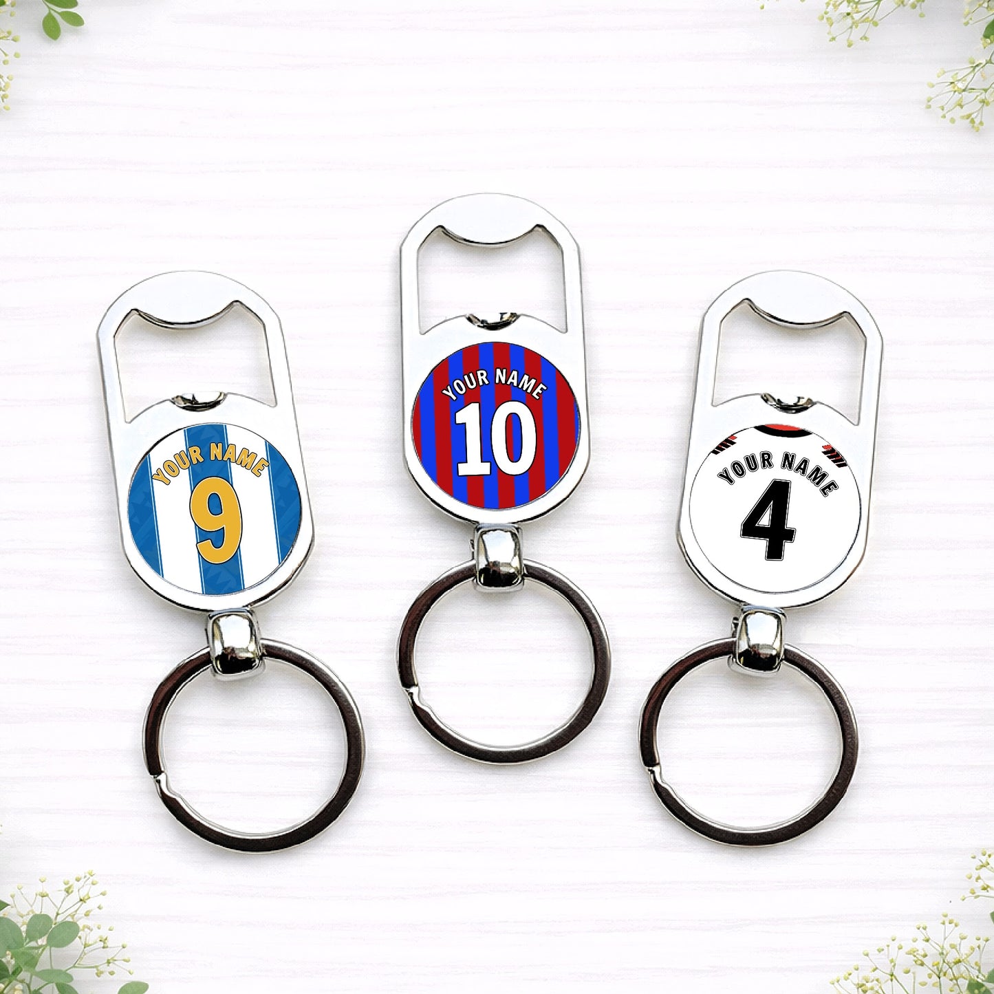 Personalised football shirt style bottle opener keyrings with custom name and number in team colours