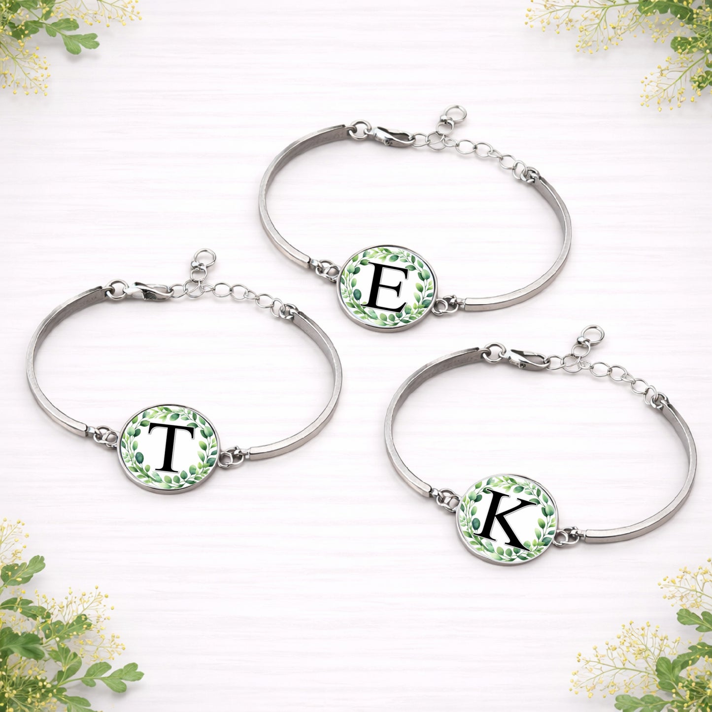 Personalised eucalyptus initial bridal party bracelet in silver with green botanical wreath design