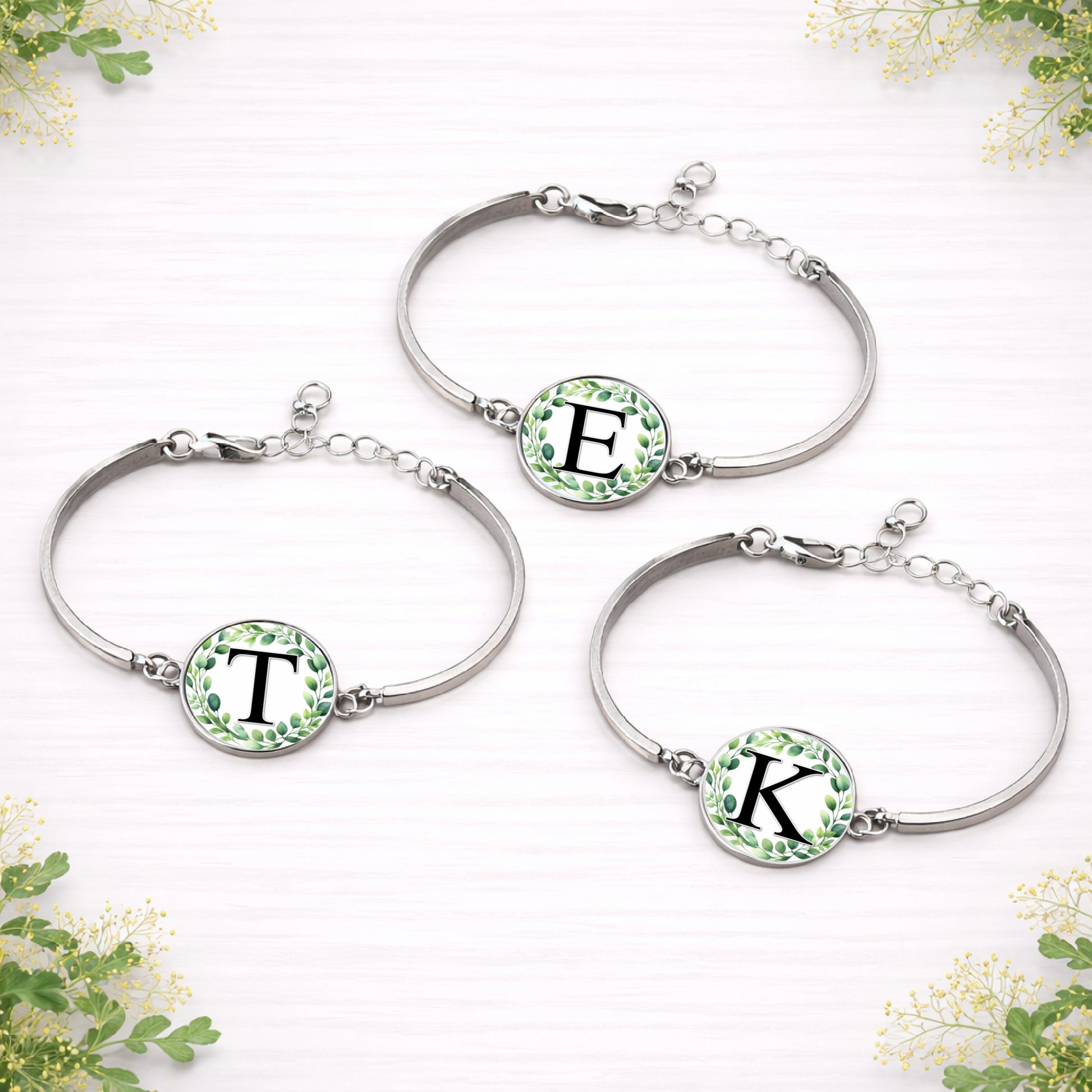 Personalised eucalyptus initial bridal party bracelet in silver with green botanical wreath design