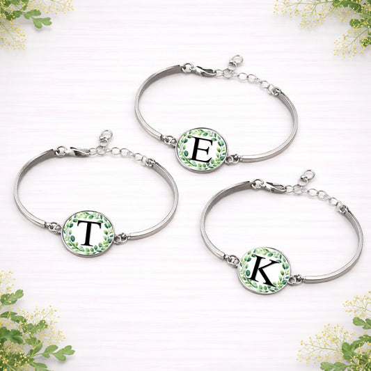 Personalised eucalyptus initial bridal party bracelet in silver with green botanical wreath design