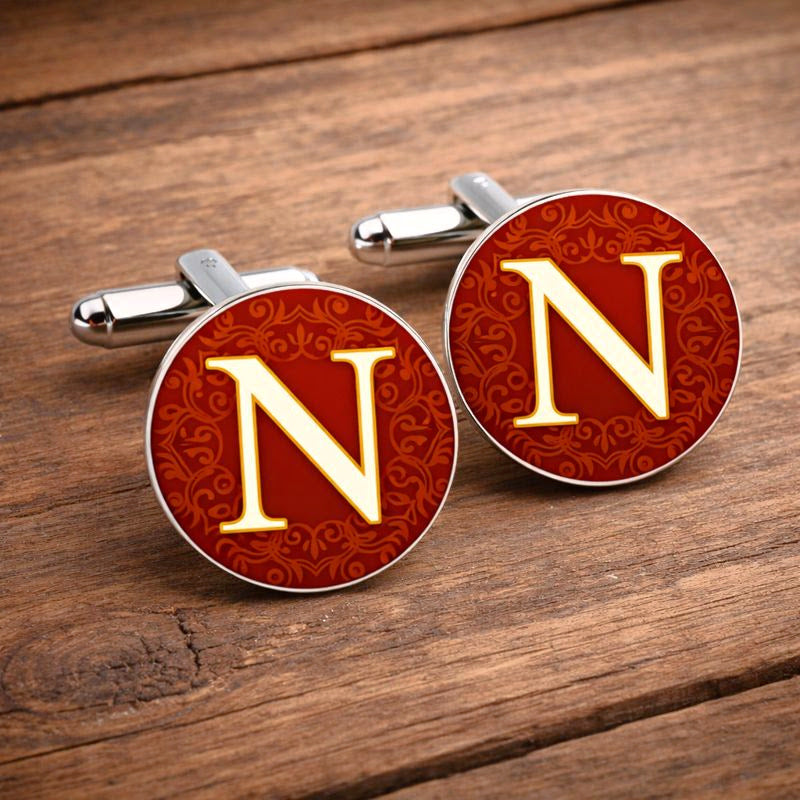 Personalised burgundy initial cufflinks with damask pattern on wooden background