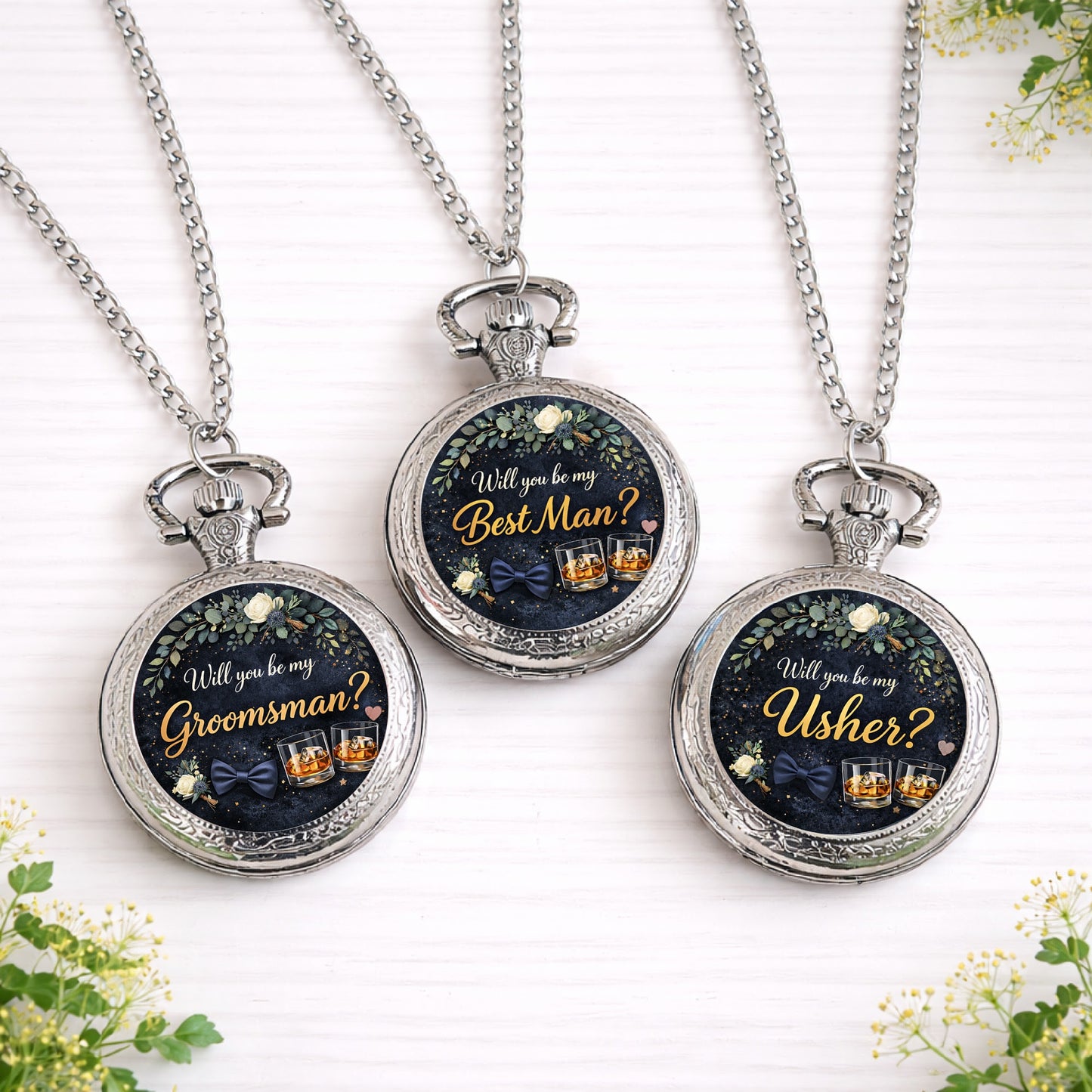 Three silver personalised pocket watches featuring “Will you be my Best Man?”, “Groomsman?” and “Usher?” designs with navy and gold wedding theme.