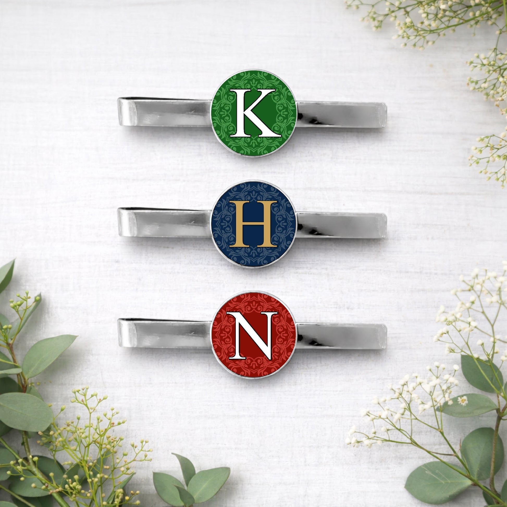 Personalised wedding colour initial tie clip with custom monogram design on silver tie bar