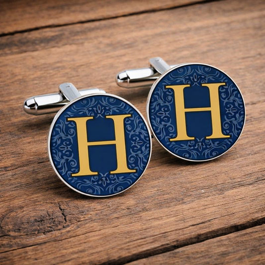 Personalised blue initial wedding cufflinks in navy and gold on wooden background