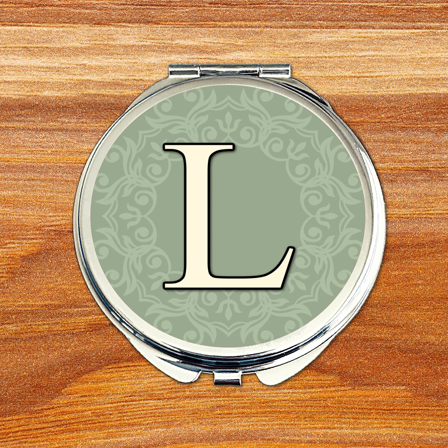 Green wedding colour monogram compact mirror with sage and eucalyptus tones, personalised initial design for bridesmaids