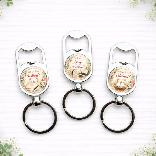 Personalised wedding role proposal bottle opener keyrings with floral designs asking “Will you Read at our Wedding?”, “Will you be our Celebrant?” and similar roles